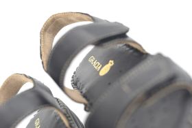White ladies' sandals with silvery accents