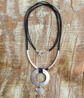 Art necklace of genuine leather
