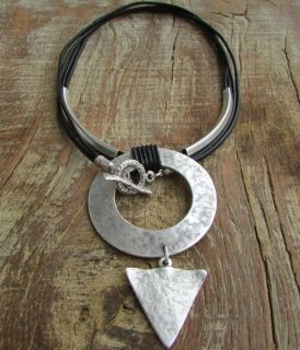 Art necklace of genuine leather