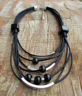 Art necklace of genuine leather