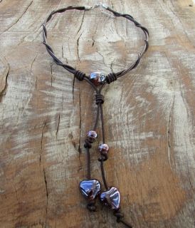 Beautiful necklace of genuine leather and ceramic