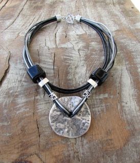 Stylish necklace of genuine leather