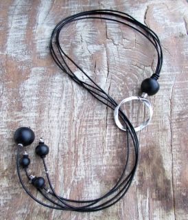 Long necklace with ceramic balls