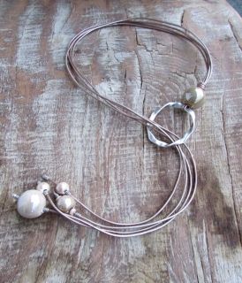 Long necklace with ceramic balls