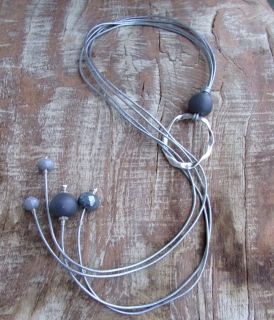 Long necklace with ceramic balls