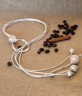 Necklace of genuine leather and ceramics