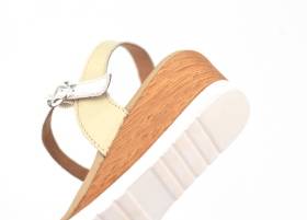 Brown ladies' slippers with decorative stitching